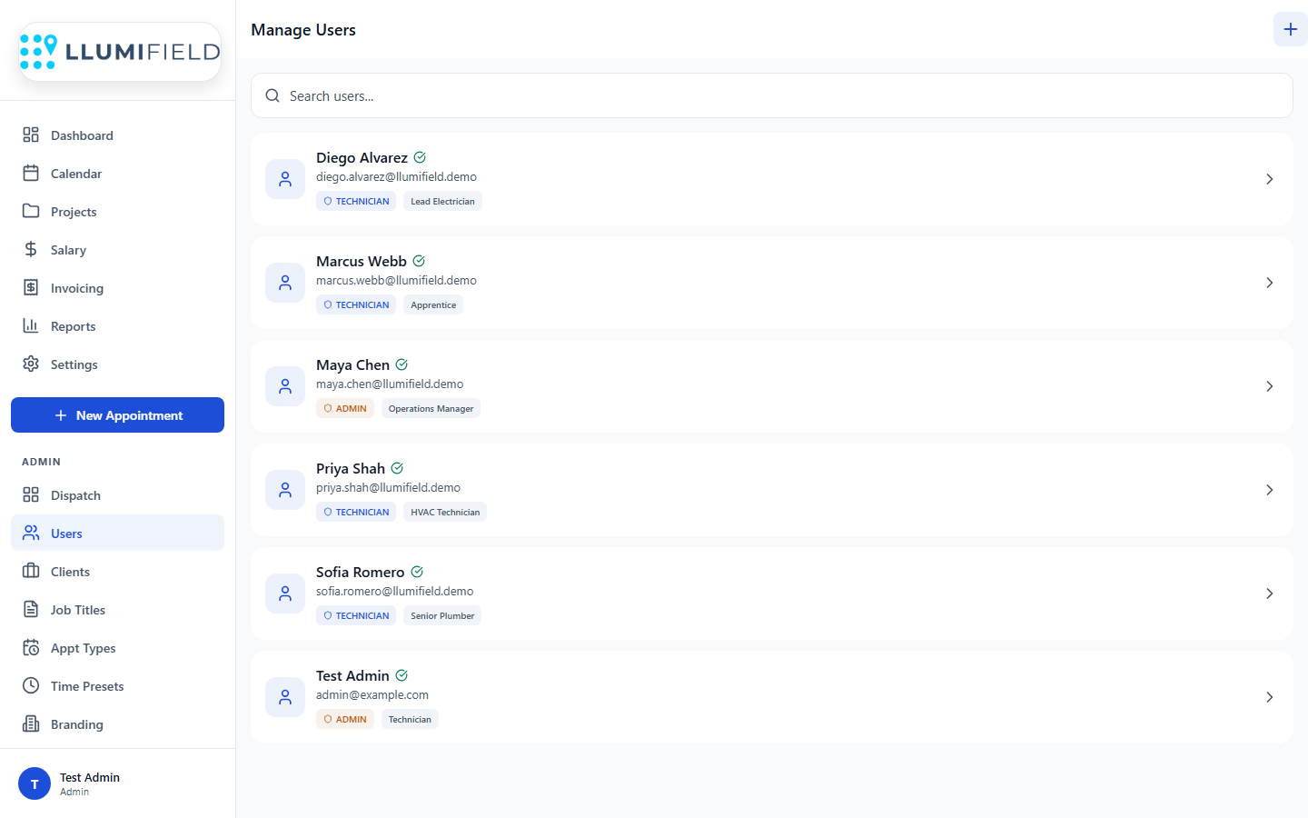 LLUMIFIELD user management page with team members, roles, and job titles